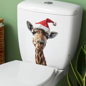 Christmas giraffe toilet seat sticker with festive red hat on white bathroom tank