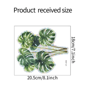 Sticker mural feuille de Monstera à texture holographique montrant les dimensions 18x20,5cm