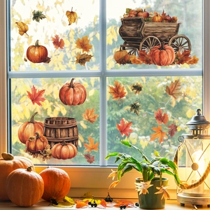 Autumn window decals with pumpkins, maple leaves, and wooden cart for home decoration