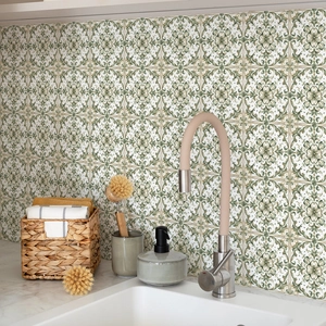 Close-up of vintage green mandala self-adhesive wall tiles in a kitchen backsplash setting