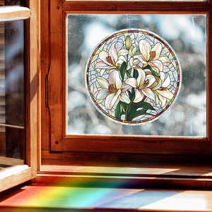 Round lily stained glass window film casting colorful rainbow light on wooden frame