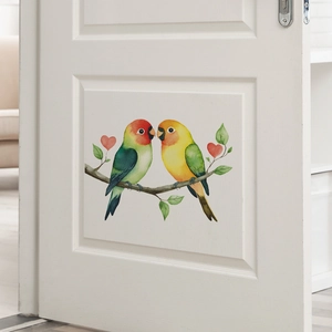 Watercolor wall sticker featuring two colorful parrots on a branch with red hearts decor