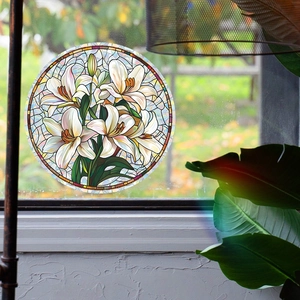 Macro detail of round stained glass lily window decal with colorful floral patterns
