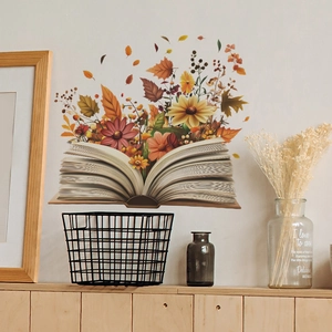 Detail of floral book wall sticker with autumn maple leaves and warm orange flowers