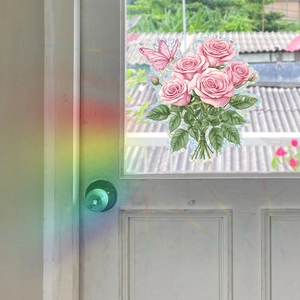 Pink rose and butterfly window film decal with rainbow light refraction on glass door