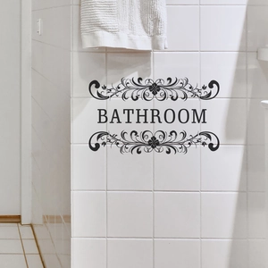 Elegant black BATHROOM wall sticker with floral patterns on white tile for decor