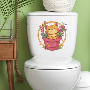 Sticker mural chat mignon dans un pot de fleurs pour salle de bain et maison