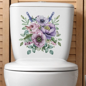 Adesivi murali floreali con fiori viola e farfalle su superficie bianca del bagno
