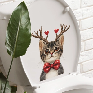 Charming tabby cat toilet sticker with reindeer antlers and red bow on white lid