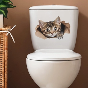3D visual effect cat wall sticker showing a kitten peeking through a torn paper hole