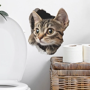 Detail view showing a 3D cat wall decal peering through a broken wall in bathroom decor