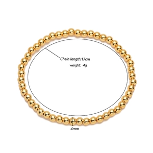 Detalle de la pulsera de cuentas doradas de 4mm con longitud de 17cm y un peso de 4g
