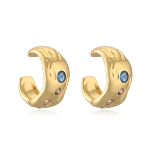 Orecchini dorati martellati irregolari con pietre preziose blu e color champagne