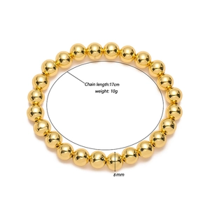 Detalles de la pulsera de cuentas doradas con perlas de 8mm y longitud total de 17cm