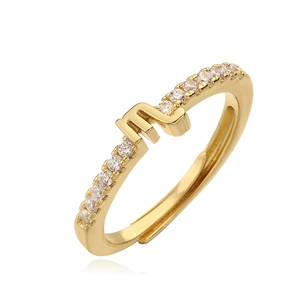 Adjustable gold Scorpio zodiac sign ring with sparkling crystals on white background