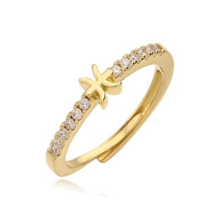 Gold plated Pisces constellation open ring with cubic zirconia paving on white background