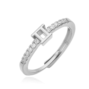 Detail of silver Gemini zodiac ring featuring sparkling cubic zirconia and adjustable band