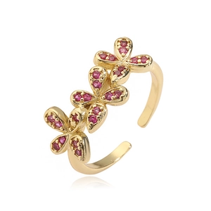 Adjustable gold flower ring with pink crystals in a stylish three-blossom open design