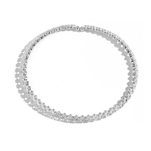 Macro shot of silver tennis choker featuring square-cut sparkling zirconia stones