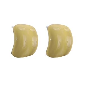 Detailed view of polished creamy yellow C-shaped stud earrings with glossy enamel finish