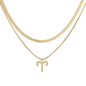 Double-layered golden Aries zodiac necklace featuring a flat snake chain and zircon pendant