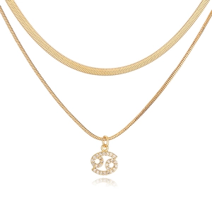 Detailed shot of double-layered gold Cancer constellation necklace with clear zircons