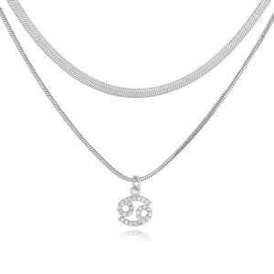 Detail of silver double layer necklace featuring snake chain and Cancer zodiac pendant