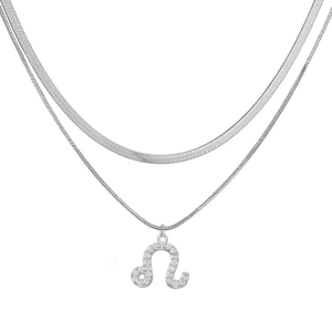 Close-up of double-layer silver herringbone chain with iced-out Leo zodiac pendant