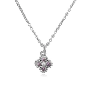 Detailed view of silver clover pendant with purple stones and beaded edge craftsmanship