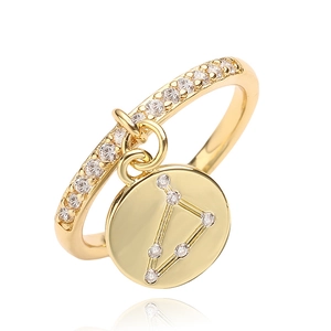 Adjustable gold zodiac ring with a Capricorn constellation pendant and zircon accents