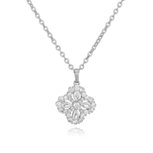 Close-up of a silver clover pendant featuring sparkling pear-cut and round crystals