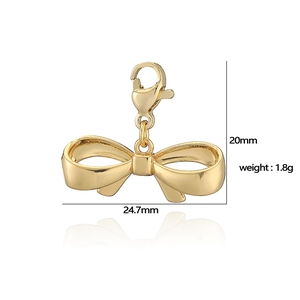 Polished gold bow pendant charm with lobster clasp detail, size 24.7mm by 20mm