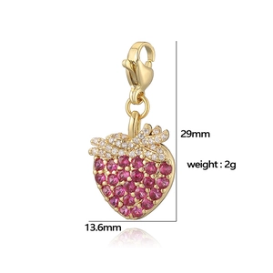 Detail view of 29mm strawberry pendant with red gemstones and lobster clasp
