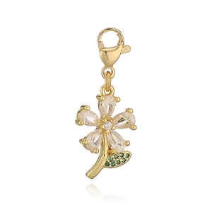 Detailed view of flower charm with five crystal petals and green pave leaves for jewelry DIY