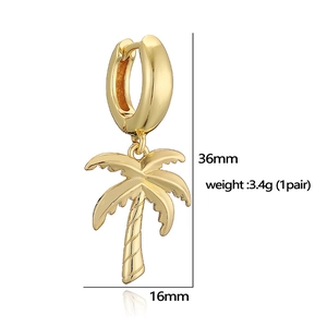 Detailed view of gold palm tree drop earrings showing dimensions of 36mm by 16mm