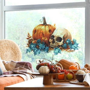 Halloween window decals with pumpkins and skulls on a bright window for home decor
