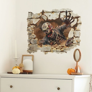 Macro detail of 3D Halloween wall sticker showing a zombie breaking through a white brick wall