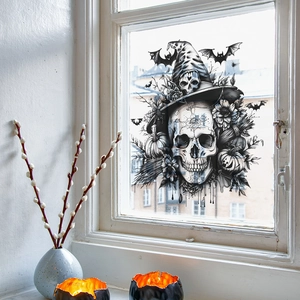 Sticker fenêtre Halloween avec crâne de sorcier, citrouilles et chauves-souris sur verre