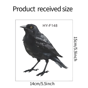 Detail view of black bird wall sticker showing 14x15cm dimensions and realistic feather texture