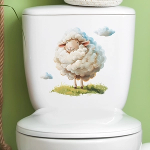 Close-up of cute cartoon sheep and clouds wall sticker on white toilet tank