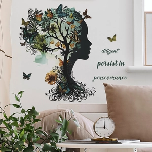 Artistic wall sticker featuring a female silhouette, life tree, and colorful butterflies
