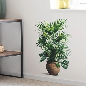 Minimalist green palm and monstera leaf wall decal with brown pot for home decor
