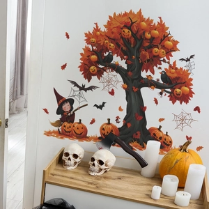 Detailed view of Halloween wall stickers featuring a pumpkin tree and cartoon witch