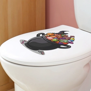 Detailed view of Halloween cauldron and candy sticker applied on a white toilet lid