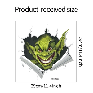 Detailed view of 3D Halloween wall sticker showing a grinning green monster through a crack
