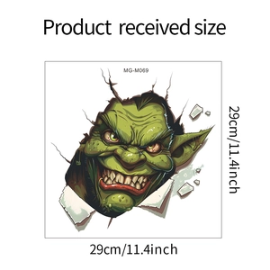 Detail view of scary green monster wall sticker showing product size and dimensions