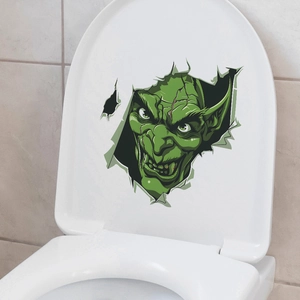 Detail of 3D green monster toilet sticker showing cracked wall effect for bathroom decor