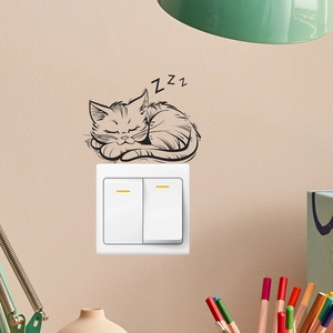 Sleeping cat wall sticker for light switches with ZZZ design in minimalist black style