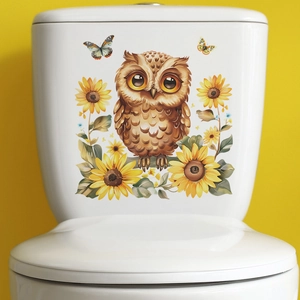 Cartoon owl and sunflower adhesive decal decorating a white ceramic toilet tank surface