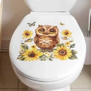 Detailed view of cartoon owl and sunflower adhesive sticker on a white toilet lid